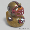 Rubber duck with San Francisco 49ers helmet and football design on a white background