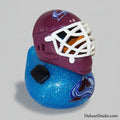 Blue rubber duck with a maroon hockey helmet on a white background