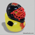 Rubber duck with a hockey helmet and cage on a white background