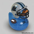 Blue duck-shaped toy with Carolina Panthers helmet and football design on a white background