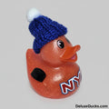 Rubber duck with a blue knit hat and 'NY' logo on a white background