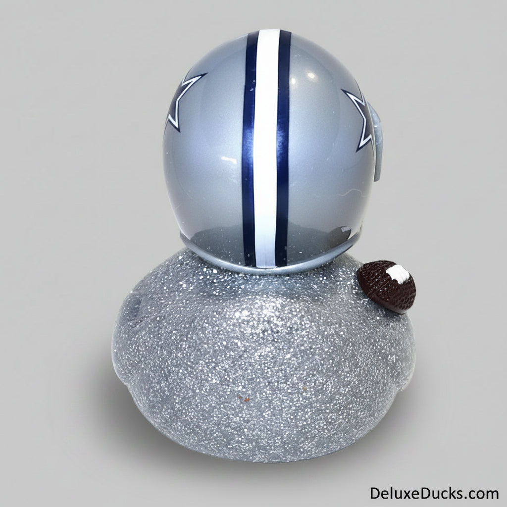 Decorative object resembling a football helmet with a glittery base on a white background