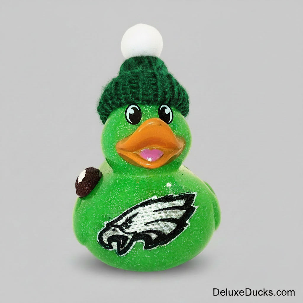 Green rubber duck with a knitted hat and logo on a beige background