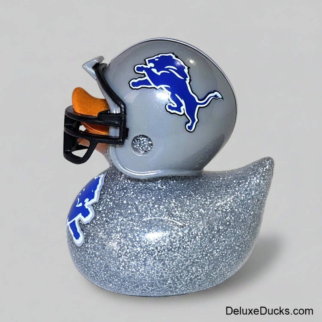 Rubber duck shaped like a football helmet with a logo on a gray background