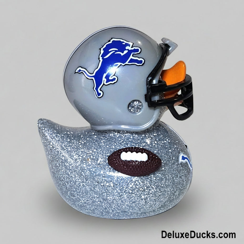 Rubber duck shaped like a football helmet with a logo on a gray background