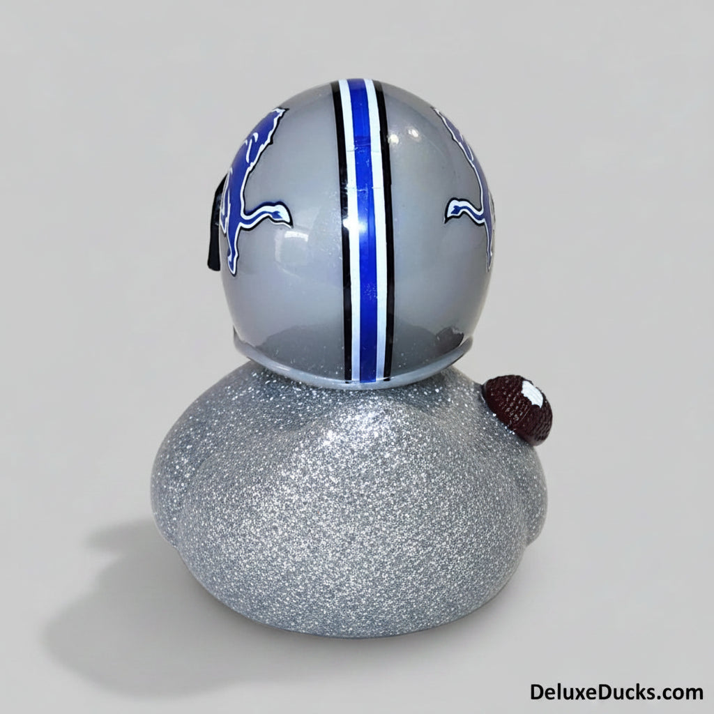 Rubber duck with football helmet design on a gray background