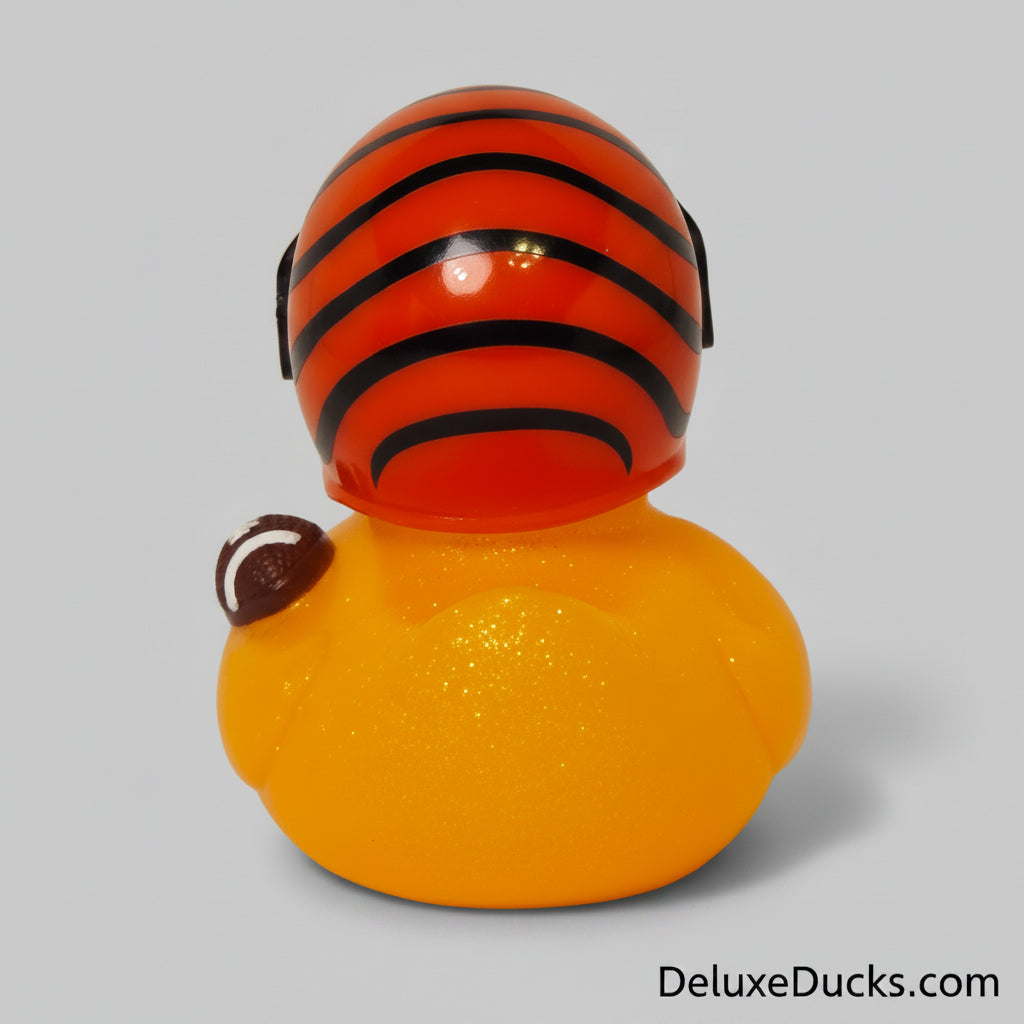 Rubber duck with tiger stripe pattern on a gray background