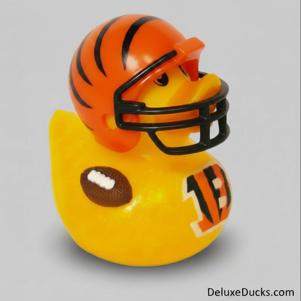 Rubber duck with a football helmet and tiger stripe design on a gray background