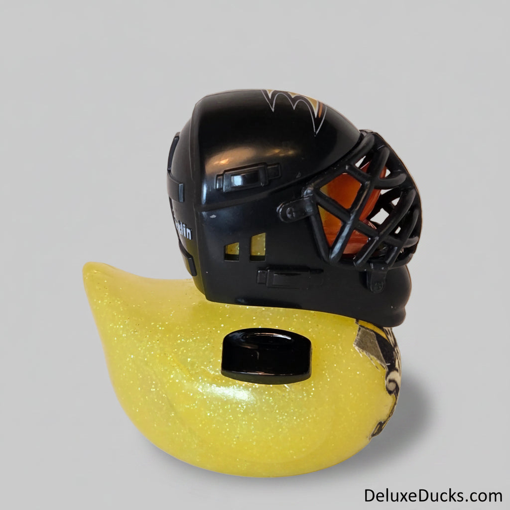 Black and yellow helmet on a white background