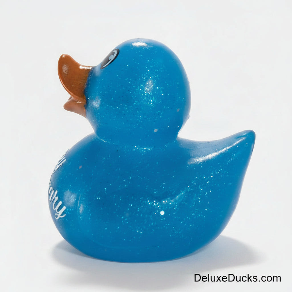 Blue glittery duck-shaped object on a white background