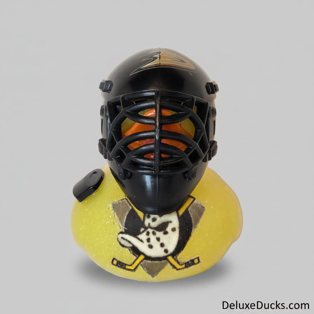 Black and yellow object with a design on a white background