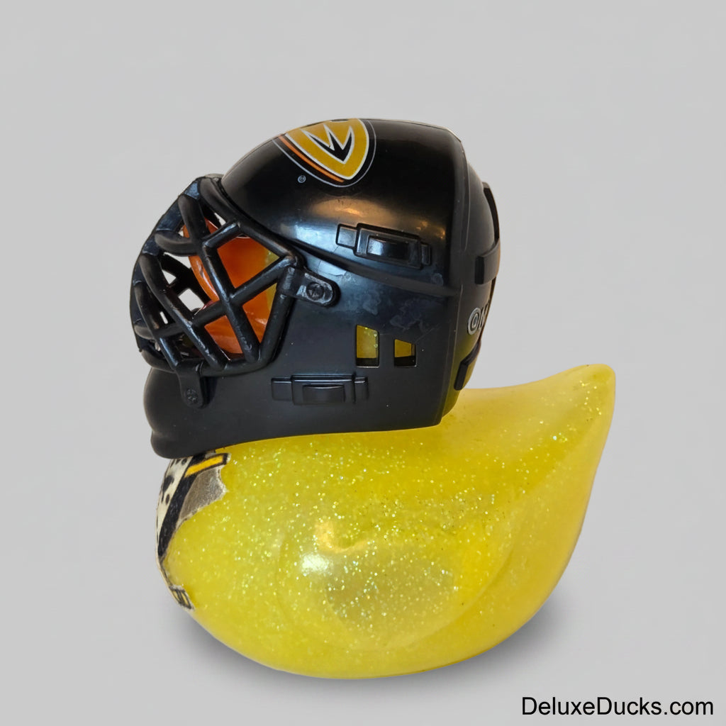 Black helmet with a yellow glider on a white background