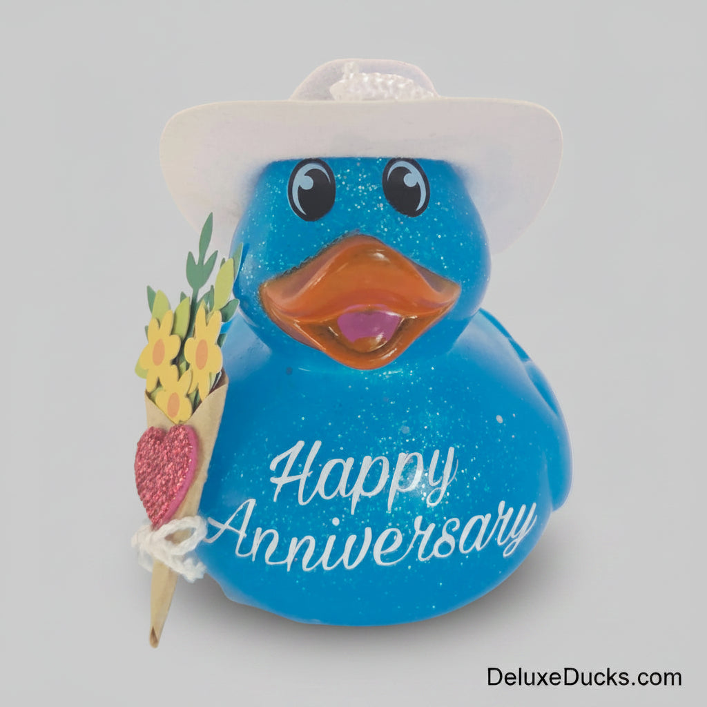 Blue duck-shaped pacifier with 'Happy Anniversary' text on a white background