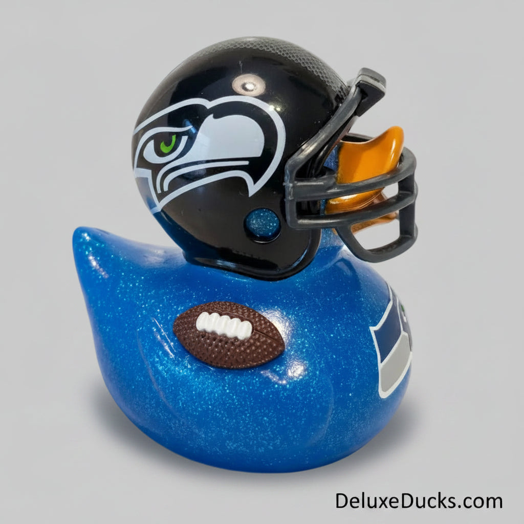 Blue rubber duck with a football helmet on a light background